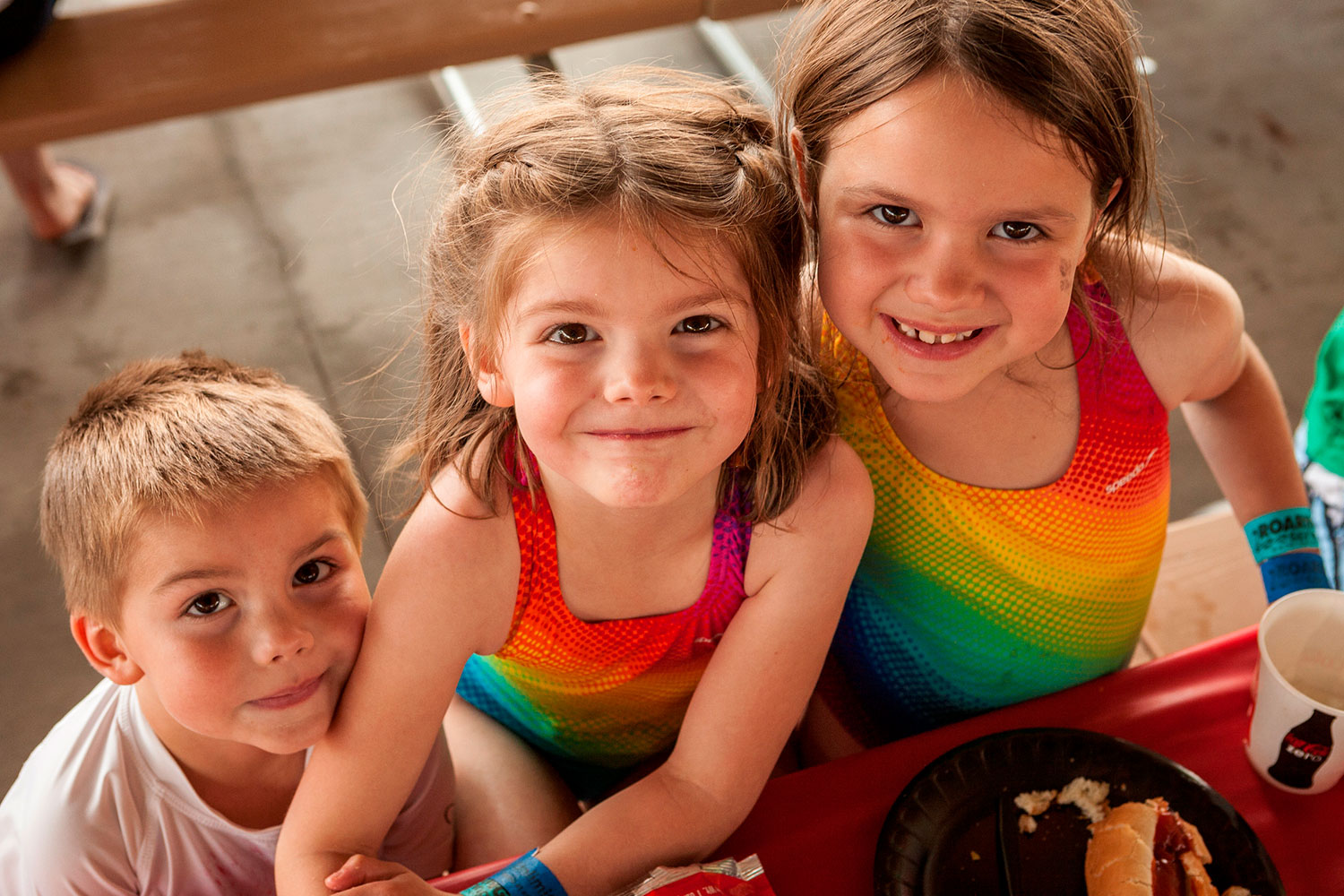 RS-cater-2-girls-&-boy Two young girls and a boy eating